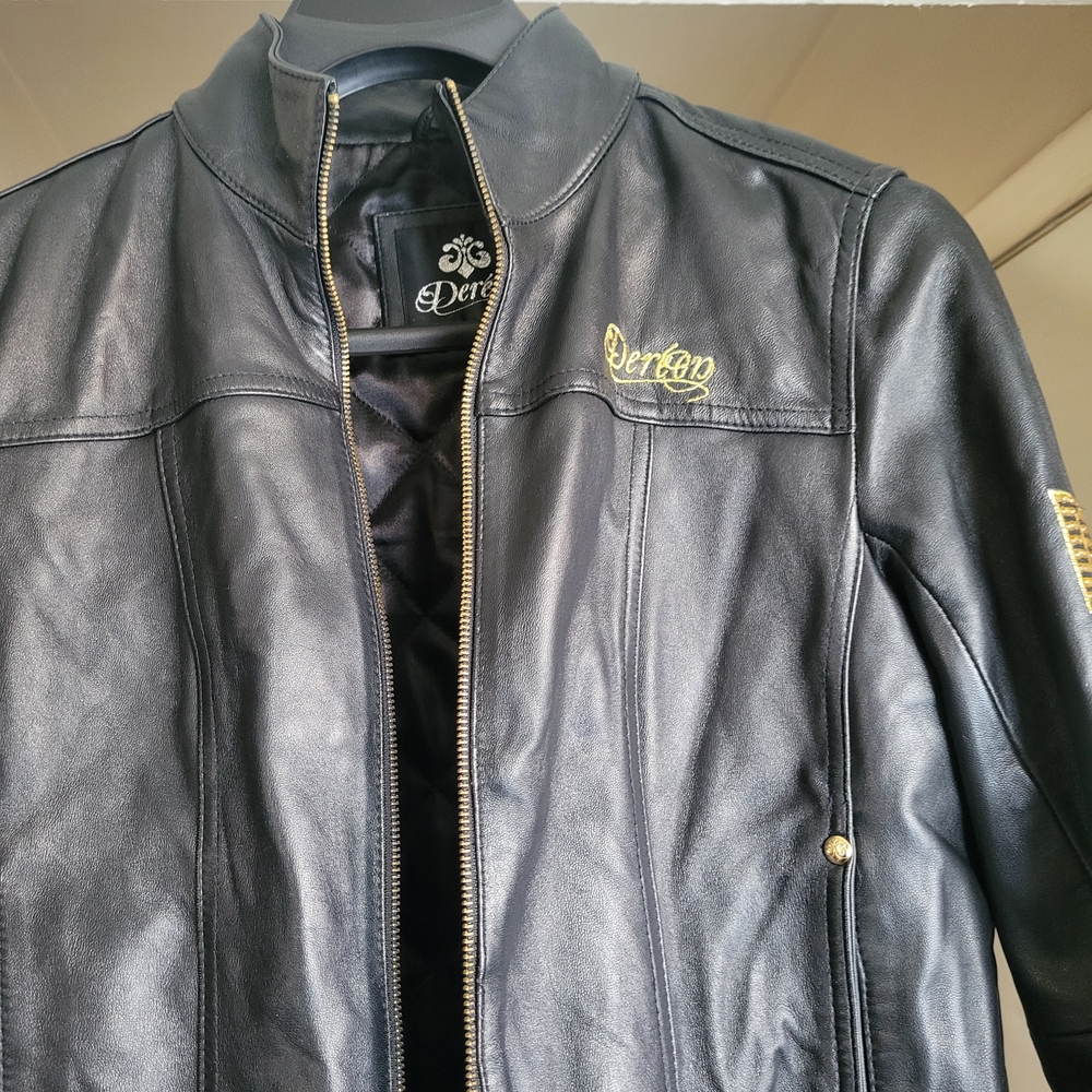 Dereon Black Leather Jacket with Gold Accents
